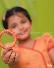 Thenmozhi